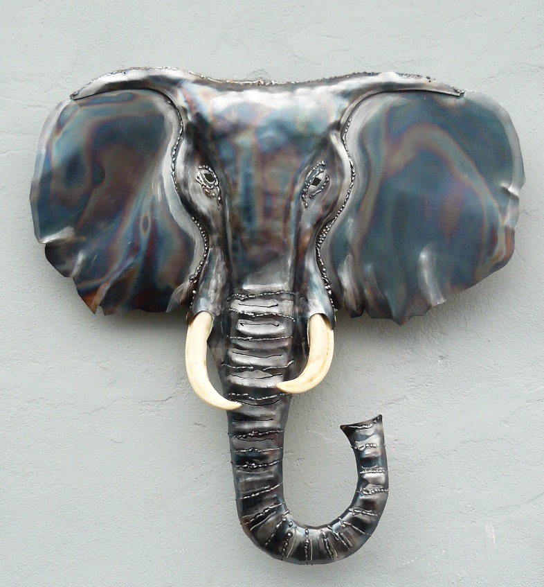 Treated steel  elephant head . Tusks are made from a wire cage and filler